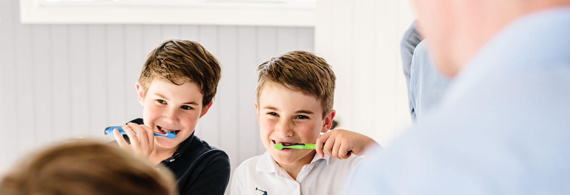 Kids brushing teeth with Dr. Grant at Method Dental