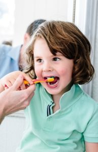 Boy brushing his teeth preventative dentistry brisbane