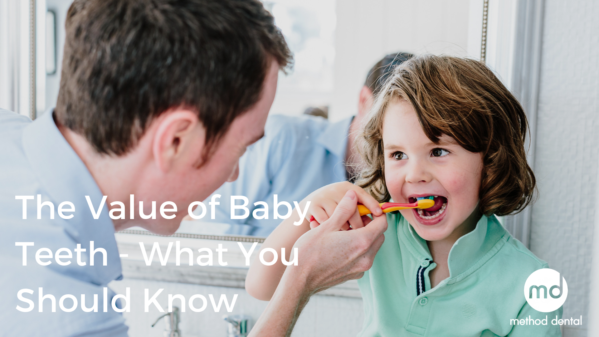 Dr. Grant brushing a child's teeth