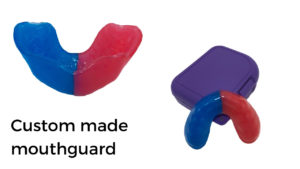 Custom mouthguards are shown here and they fit well, are comfortable to wear and offer the most protection.