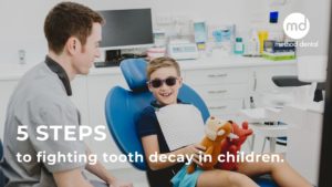 Dr. Grant with a child at Method Dental