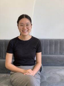 Dr. Sharon Chen sitting on the couch at Method Dental
